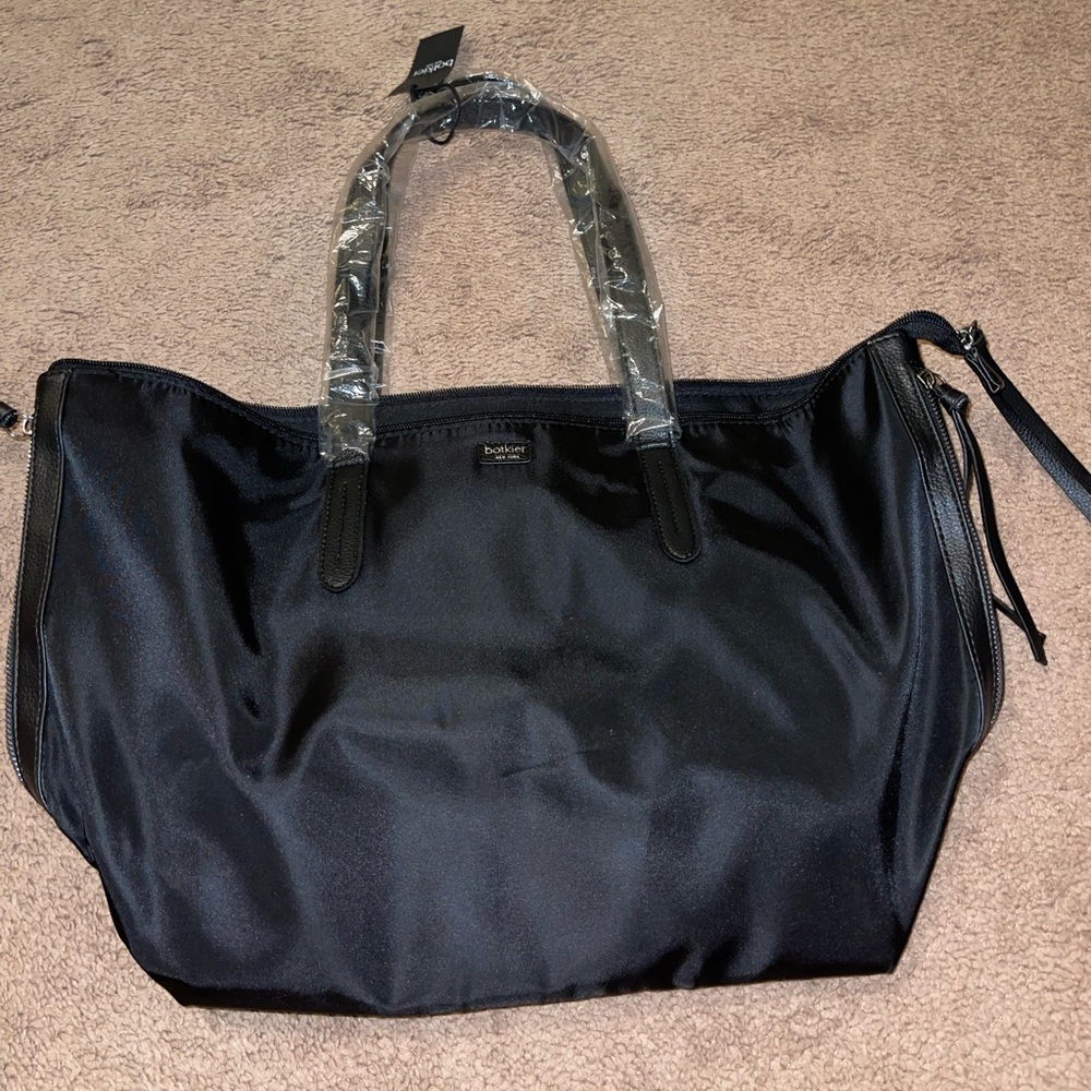 Botkier tote bag new, never used. Still has tag and handle covers.